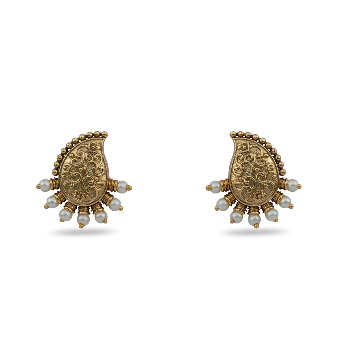 A close up image of a mango shaped gold plated earrings with white beads.